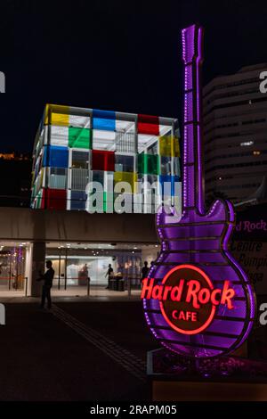 The guitar of Hard Rock Cafe with the Centre Pompidou museum in the background, Malaga, Spain Stock Photo