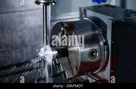 Metalworking CNC milling machine. Cutting metal modern processing Hi-technology machining concept. Stock Photo