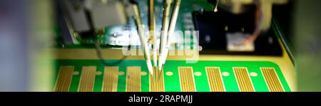 Automated technology of Assembly of computer circuit board Electronic production in machinery and technology, Stock Photo