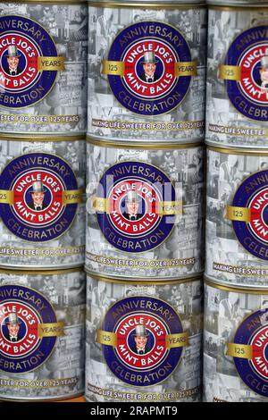 Celebration tins of Uncle Joes Mint Balls in a shop window Stock Photo