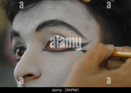 Mime artists from a mime group,'Sur-Pancham', are getting ready for a performance in a green room of an auditorium at Agartala. Tripura, India. Stock Photo