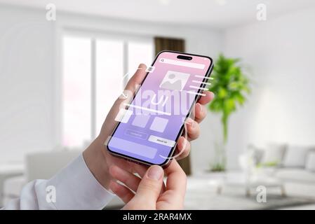 Concept of using a mobile app. Complicated or simple user interface. App elements fly over mobile phone display Stock Photo