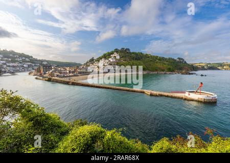 Looe Harbour and sea wall at high-tide, Cornwall Stock Photo
