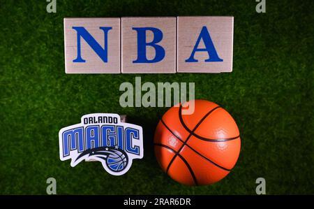 January 30, 2023, Springfield, USA. The emblem of the Orlando Magic National Basketball Association club on the green lawn of the stadium. Stock Photo