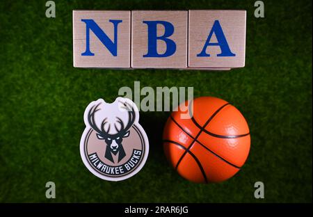 January 30, 2023, Springfield, USA. The emblem of the Milwaukee Bucks National Basketball Association club on the green lawn of the stadium. Stock Photo