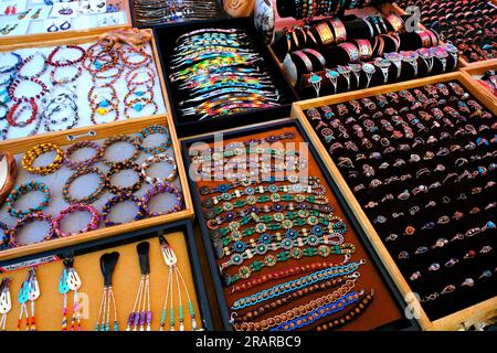 Navaho handmade jewelry and art for sale at roadside stand Stock Photo