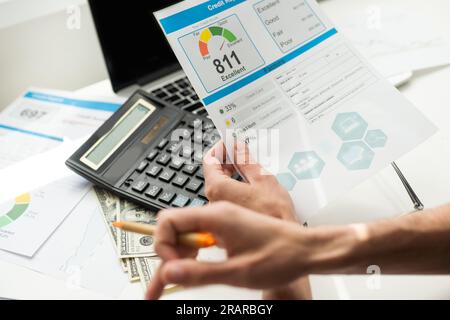 Credit Report with Score rating app on smartphone screen showing creditworthiness of a person for loan and mortgage application based on payment Stock Photo