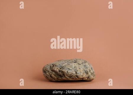 Mock up display shelf,cosmetics,advertising and natural products,blue stone pedestal scene on beige background. Advertising and presentation concept Stock Photo