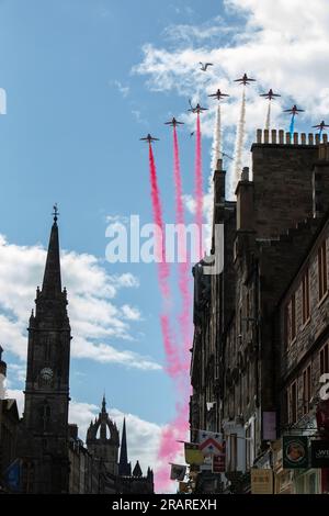 Edinburgh, Scotland, 5th July 2023. The Red Arrows fly above the Royal Mile High Street as Scotland marks the Royal Coronation of His Majesty King Charles III, in Edinburgh, Scotland, on 5 July 2023. Photo credit: Jeremy Sutton-Hibbert/Alamy Live News Stock Photo