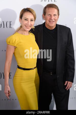 Hong Kong, China. 18th Mar, 2016. CoCo Lee Dead at 48.American Hong Kong Cantonese Pop star Coco Lee in a FILE IMAGE with her now ex-husband Bruce Philip Rockowitz, a Canadian business man and close friend to Victoria and David Beckham. Coco Lee died on 5th July 2023 following several days in a coma after an attempted suicide. Credit: Jayne Russell/Alamy Live News Stock Photo
