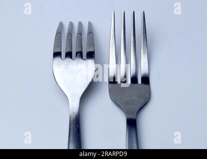 two forks isolated on white background Stock Photo