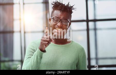 I choose you Confident mature man pointing you and smiling Stock Photo