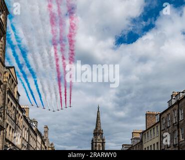 Royal Mile, Edinburgh, Scotland, UK, 5th July 2023. King Charles III Service of Thanksgiving: Red Arrows flypast as the celebration comes to an end. Credit: Sally Anderson/Alamy Live News Stock Photo