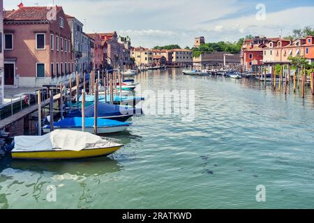 Boatyard with many boats on the water in Venice, Italy. Stock Photo