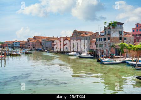 Boatyard with many boats on the water in Venice, Italy. Scenic landscape in Venice. Stock Photo