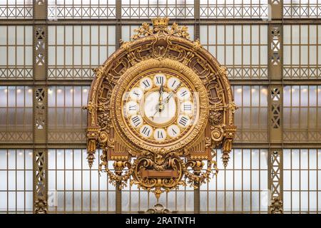 Ornamental golden clock in Orsay Museum, French: Musee d Orsay, in former train station building, Paris, France. Stock Photo