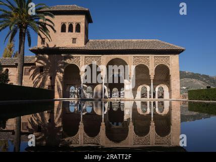 Alhambra Palace in Granada Spain palaces Nazaries, symmetrical reflection in the mirror of water Stock Photo