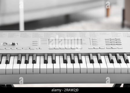 Modern synthesizer in room, closeup Stock Photo