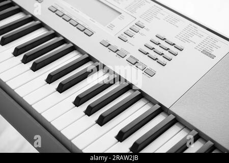 Modern synthesizer in room, closeup Stock Photo
