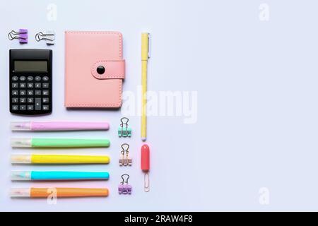Modern calculator with different stationery on white background Stock Photo