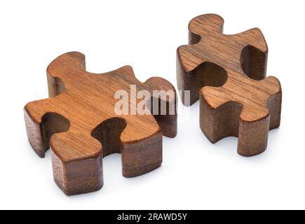 Two wood Puzzel Pieces Cut Out on White. Stock Photo