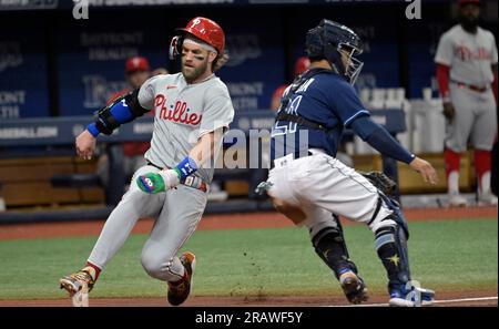 St. Petersburg, FL USA: Philadelphia Phillies designated hitter Bryce  Harper (3) is congratulated by left fielder Kyle Schwarber (12) after  hitting h Stock Photo - Alamy