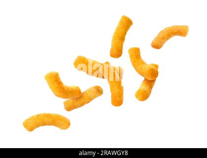 Many tasty corn sticks falling on white background Stock Photo