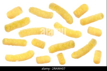 Many tasty corn sticks falling on white background Stock Photo