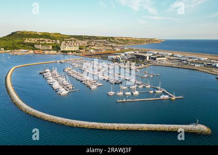 Isle of Portland, Dorset, UK.  5th July 2023.  Aerial view from the air of the marina at Portland harbour near Weymouth in Dorset.  The asylum accommodation barge the Bibby Stockholm is due to be berthed nearby at Portland Port this month.  Picture Credit: Graham Hunt/Alamy Live News Stock Photo