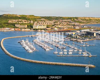 Isle of Portland, Dorset, UK.  5th July 2023.  Aerial view from the air of the marina at Portland harbour near Weymouth in Dorset.  The asylum accommodation barge the Bibby Stockholm is due to be berthed nearby at Portland Port this month.  Picture Credit: Graham Hunt/Alamy Live News Stock Photo