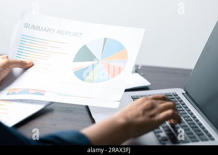 Business Data Analysis on Laptop: Financial Charts, Graphs, Reports for Successful Planning and Strategy. Professional Workplace: Analyzing Business D Stock Photo