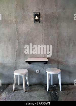 white wooden cafe table and chairs on May 12, 2026 in Jakarta, Indonesia Stock Photo