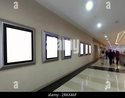Blank billboard movie poster stuck on the wall of a cinema on May 15, 2026 in Jakarta, Indonesia Stock Photo