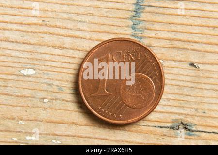coin one cent macro photo on wooden background Stock Photo