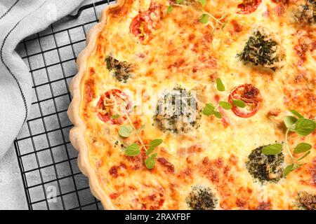 Delicious homemade quiche on table, top view Stock Photo