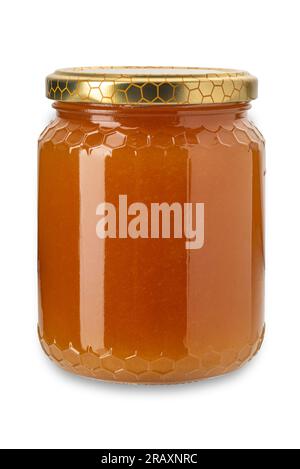 Creamy chestnut honey in glass jar, crystallised honey indicating authenticity. Isolated on white with clipping path included Stock Photo