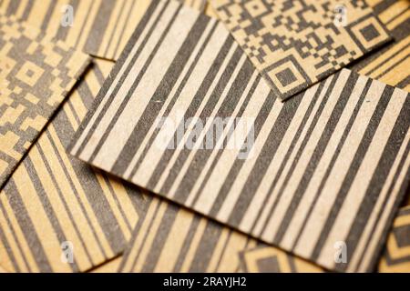 Close up of a barcodes and qr codes printed on brown cardboard Stock Photo