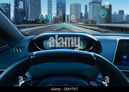 Augmented reality car navigation concept. Driver's view of the city and streets Stock Photo