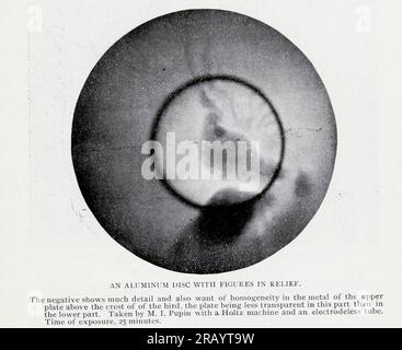 Aluminum disk Under X-ray from the Article PROFESSOR RONTGEN'S DISCOVERY OF A NEW RADIANCE. by Michael I. Pupin from The Engineering Magazine DEVOTED TO INDUSTRIAL PROGRESS Volume X October 1896 NEW YORK The Engineering Magazine Co Stock Photo