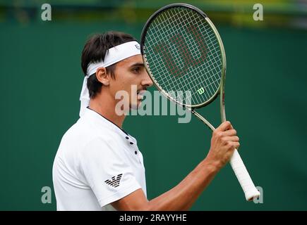 Lorenzo Sonego reacts during his match against Matteo Berrettini (not pictured) on day four of the 2023 Wimbledon Championships at the All England Lawn Tennis and Croquet Club in Wimbledon. Picture date: Thursday July 6, 2023. Stock Photo