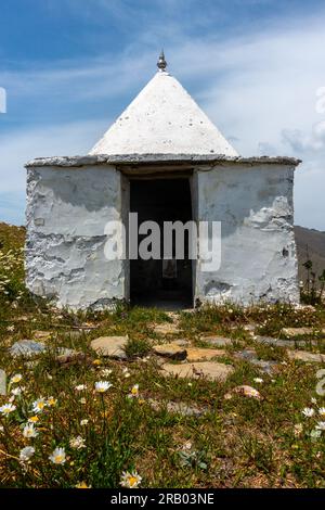 A small temple on a hilltop. These small dome temples are typical in the Himalayan region of Uttarakhand. Stock Photo