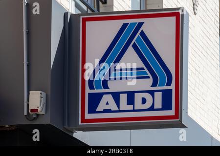 Sign and logo of an Aldi store. Aldi is an international hard-discount supermarket chain of German origin Stock Photo