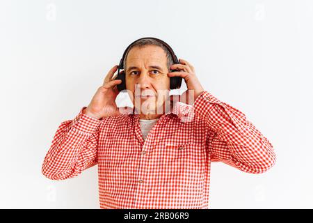 Portrait middle-aged man in headphones Stock Photo
