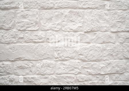 whitewashed stone wall background or texture Stock Photo
