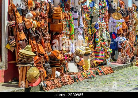 Traditional trade of typical products, souvenirs and gifts of various types in the streets and sidewalks of Pelourinho in the city of Salvador, Bahia Stock Photo