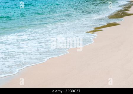 Soft beautiful ocean wave on sandy beach. Background. Copy space. Stock Photo