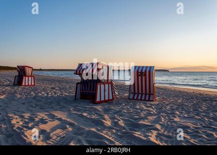 Three beach chairs, sunrise on the beach of Thiessow, Baltic Sea, island of Rügen, Mecklenburg-Western Pomerania, Germany Stock Photo