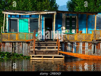 Old houseboat on Dal Lake, Jammu and Kashmir, Srinagar, India Stock Photo