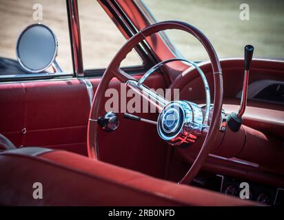 The interior of an Chevrolet Impala car showing the red interior Stock Photo