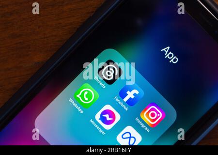 Vancouver, CANADA - Jul 5 2023 : Threads app, Facebook, Instagram, WhatsApp, Facebook Messenger and Meta Platform Inc icons seen in an iPhone screen. Stock Photo